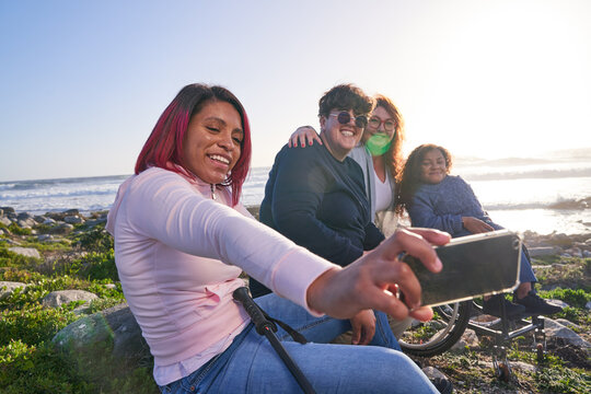 Disabled friends taking selfie outdoors - Powered by Adobe