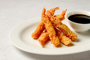 Fried shrimp, peeled in tempura, soy sauce, close-up,