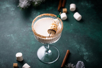 Christmas cocktail with toasted marshmellow