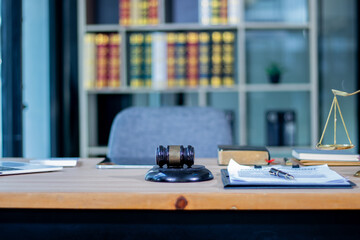 Judge's gavel on table in lawyer's office and