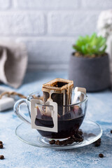 Freshly brewed drip coffee in glass cup