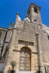 Divino Salvador church in the old town of the white beautiful village of Vejer de la Frontera in a sunny day, Cadiz province, Andalusia, Spain