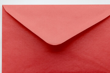 Red envelope with white background. Red envelope with a gray background. Gray envelope lying on a gray background. Envelope lying on a gray background with a red lifestyle letter.