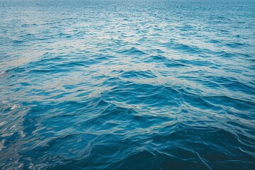 Obraz premium A photo of a vast expanse of water, possibly an ocean or sea