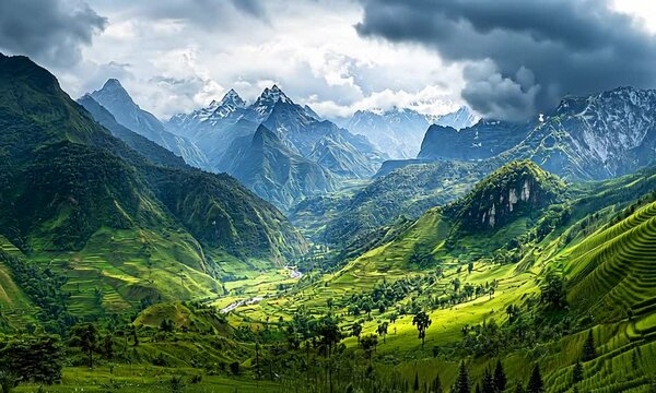 Lush mountainous landscape with dramatic clouds and valleys.
