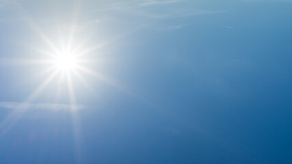 Obraz premium Blue sky with shining sun