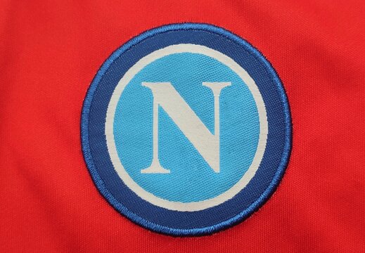 Closeup view of the Societa Sportiva Calcio Napoli emblem featured on the 2021-2022 season fourth kit.
