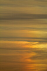 Blurry background of red sunset sky. Dramatic sky with colorful cloud background. Red burning sunset sky. Copy space.