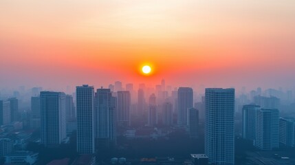 Fototapeta premium Smoggy cityscape hiding under a cloudy sky with faded sunlight