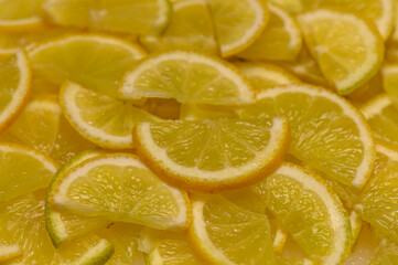 Delightful citrus slices laid out on a surface, showcasing a vibrant yellow feast for the senses