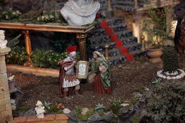 Roman soldier meeting mother and child in nativity scene