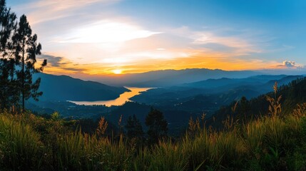 Scenic panorama view captured at golden hour showcasing serene landscape with lake and mountains under vibrant sunset colors.
