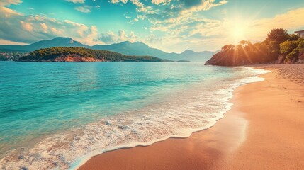 Luxury tropical beach sunrise with tranquil waves and mountains in background creating a serene resort atmosphere for relaxation and escape.