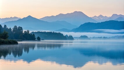 Fototapeta premium Serene Sunrise Misty Lake and Mountain Reflections, Landscape Photography, Tranquil Nature Scene, Alpine Scenery Keywords Lake, Mountains