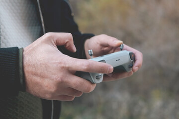 hand with a remote control control
