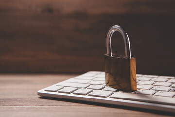 padlock and laptop with copy space