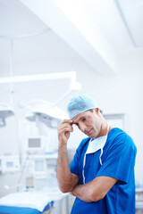 Burnout, surgery and thinking with man in hospital for patient loss, healthcare and frustrated....