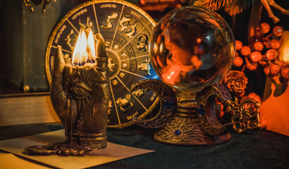 Rite with a burning candle, night mystery atmosphere, Christmas eve, Yule or another day