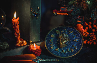 Rite with a burning candle, night mystery atmosphere, Christmas eve, Yule or another day