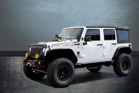 Hickory, North Carolina, USA-10 Dec 2024: White Jeep Rubicon on custom background