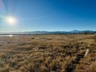 Rural farmland with mountains.