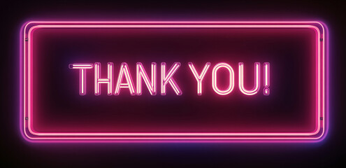 Bright neon sign displays thank you message against dark background to convey appreciation and gratitude in a vibrant setting