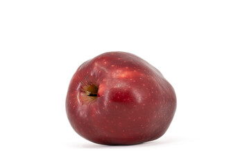 A bright red apple with a glossy, shiny peel, beautifully displayed against a clean white background