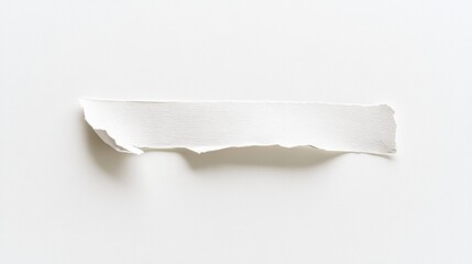 Single strip of torn white masking tape