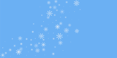 Snowflakes. Snow, snowfall. Falling scattered white snowflakes on a blue background.