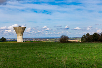 A water tower in the French countryside. Drinking water  reserve tower. Water tower in the...