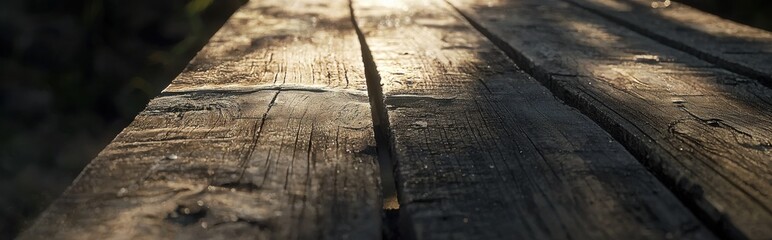 Distressed walnut boards with rich brown tones and signs of wear.
