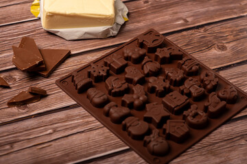 mold for making chocolates for Christmas. Home cooking and baking, making chocolates for Christmas.