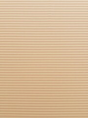 Obraz premium Brown striped kraft paper texture with natural earthy tones and a rustic feel, packaging, craft