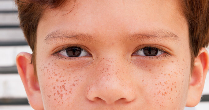 Optometry, closeup and eyes of child for vision, optometry and eyesight improvement for healthcare. Ophthalmology, face and portrait of young boy kid with optical wellness awareness for visual.