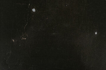 Old metal texture background in black, captured in close-up