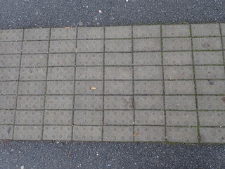 Fototapeta premium grey city pavement tiles texture