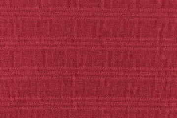 Fototapeta premium Background of fabric texture in red tones with horizontal lines, highlighting its vibrant design