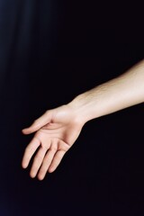 A person stretches out to grab a flying frisbee, great for sports and recreation photography