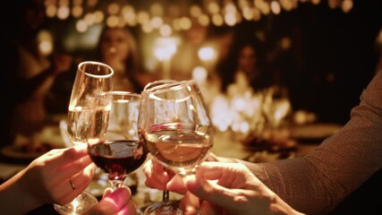 Festive Wine Glasses Toast Celebration With Friends At Dinner Party Night Cheers - Powered by Adobe
