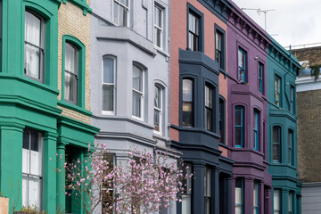 Touristic route on Notting Hill, walking on streets with colourful houses, Portobello road, city life, wealthy neighbourhoods in London, UK