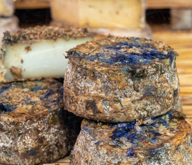 Farmer shop in Biarritz, France, Basque Country and Pyrenees sheep, goat cheeses for sale, smoked...