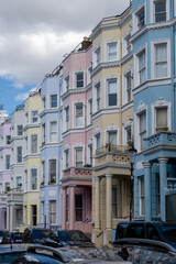 Touristic route on Notting Hill, walking on streets with colourful houses, Portobello road, city life, wealthy neighbourhoods in London, UK