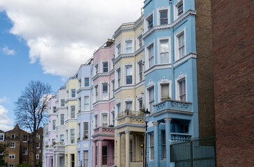 Touristic route on Notting Hill, walking on streets with colourful houses, Portobello road, city life, wealthy neighbourhoods in London, UK