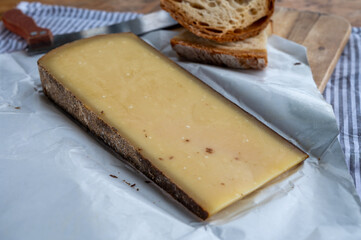 French aged in caves cheese Comte, made from unpasteurised cow milk Prestige,  Vieille Reserve close up