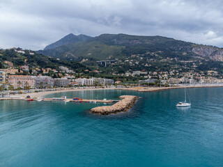 Aerial view on French Riviera, colorful Menton old city and marina on Mediterranean Sea near French-Italian border, travel destination, panoramic view from above