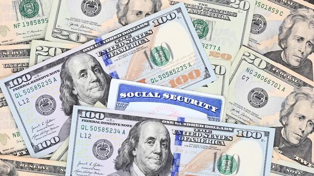 Social Security card with 20 and 100 dollar bills. SS number is a nine digit number issued to U.S. Citizens and is required to legally be employed in the United States
