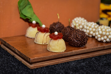  candy in a box, sweets, candy table, party sweets, candy balls, white brigadeiro, brigadeiro, box of candies, sweet with apricot