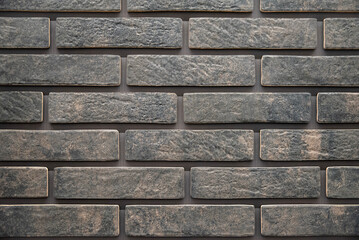Exterior wall cladding with decorative brick design