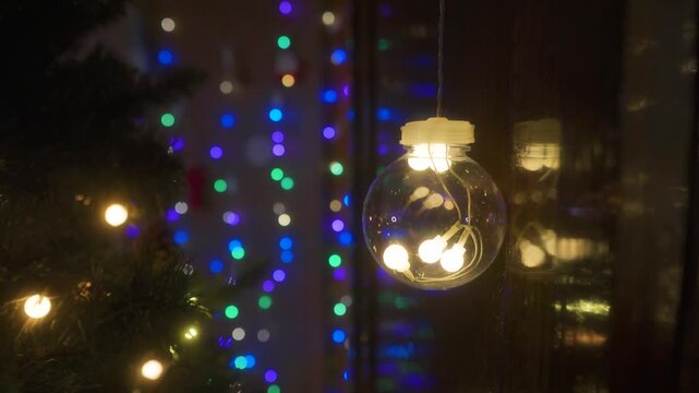 Christmas composition with a light bulb in the foreground. Christmas background.