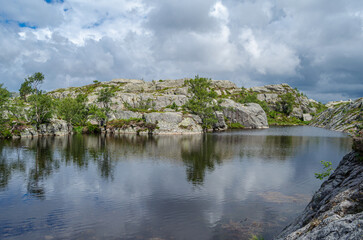 Mountain lake on the route to Preikestolen (The Pulpit Rock), a tourist attraction in Rogaland county, Norway
